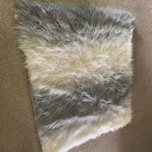 48” by 54” fur throw blanket